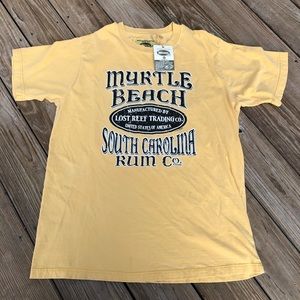 NWT T-Shirt wings Size XL mens
Has pin holes